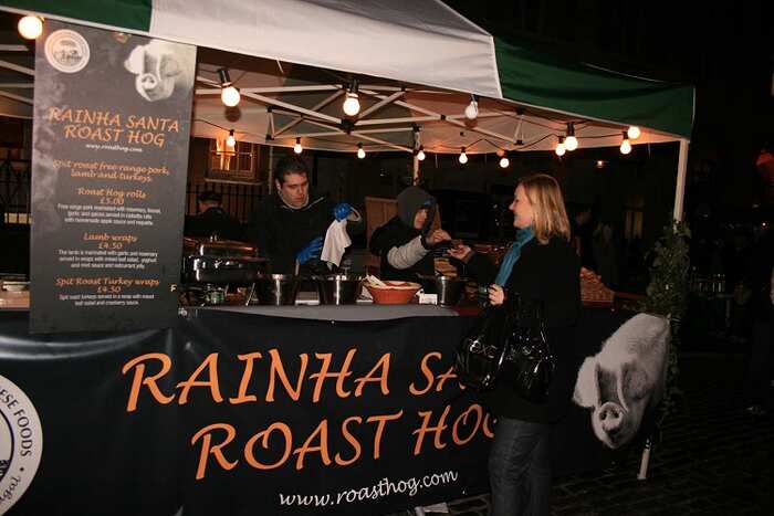 The Rainha Santa Roast Hog stall at a night market